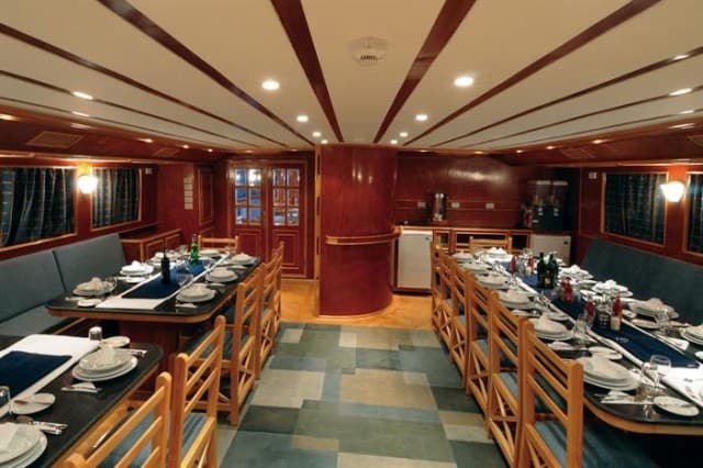 mv blue melody dining area liveaboard review